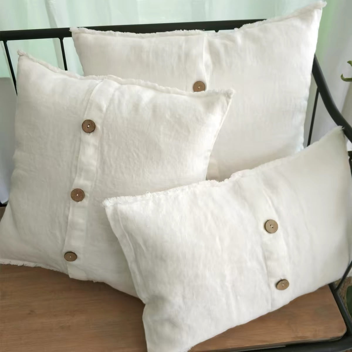 Washed Linen Cushion Cover with Button Detail and Frayed Edge product image