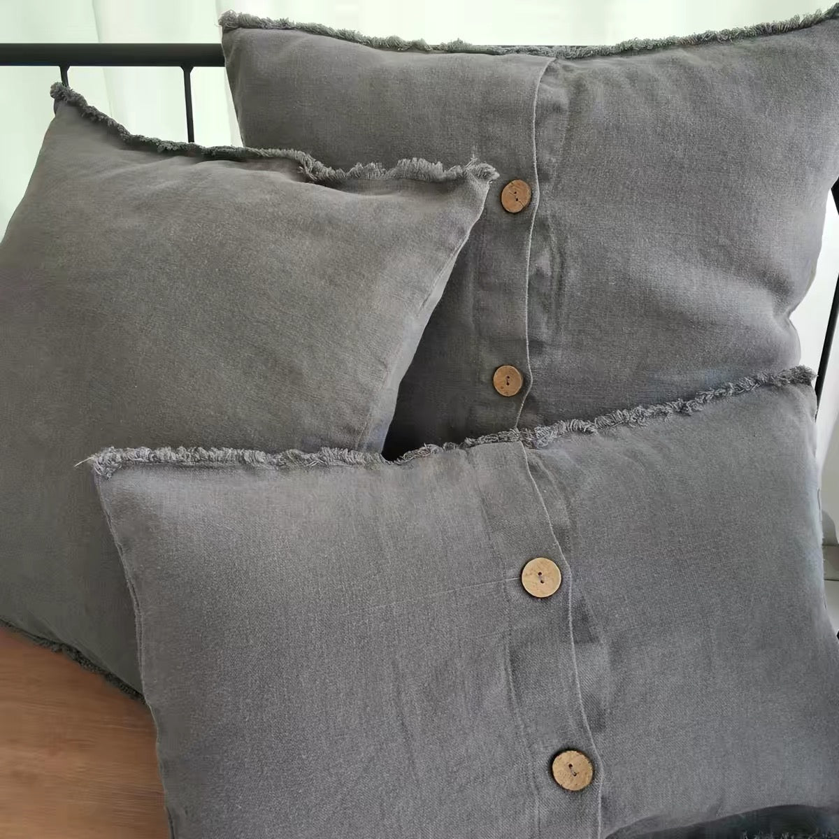 Washed Linen Cushion Cover with Button Detail and Frayed Edge product image