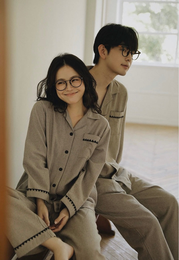 Matching taupe striped sleepwear with black trim at cuffs and pocket